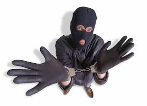 Thief With Handcuffs